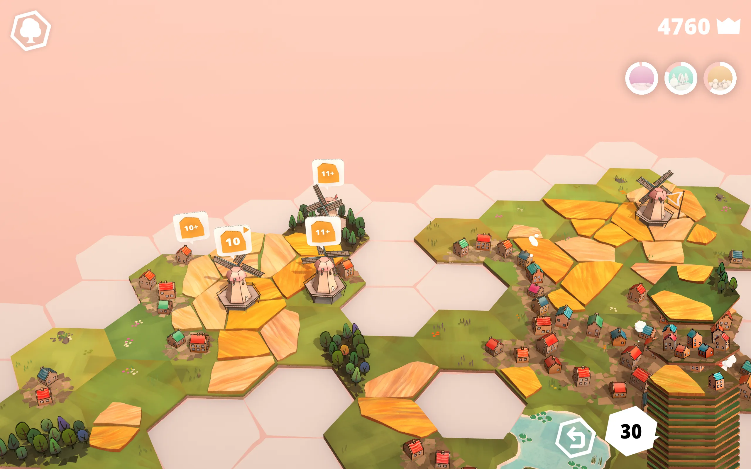 Windmills are surrounded by fields of wheat